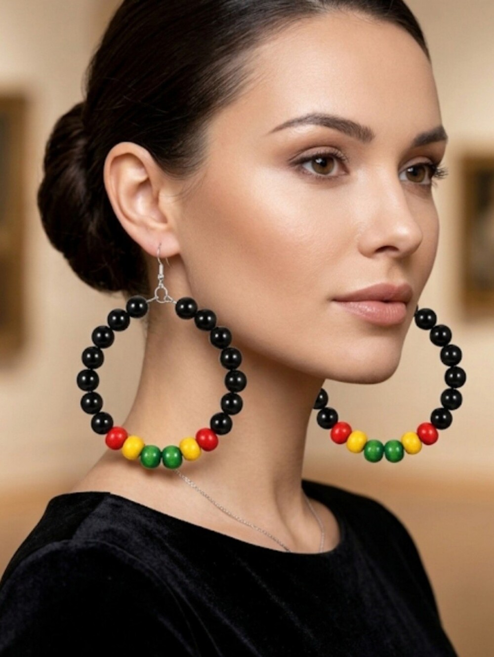 Elegant hoop earrings featuring Black and multicolored wooden beads. Their light